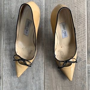 Jimmy Choos tan stilettos